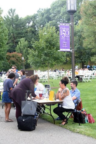 People and chairs spread across the quad