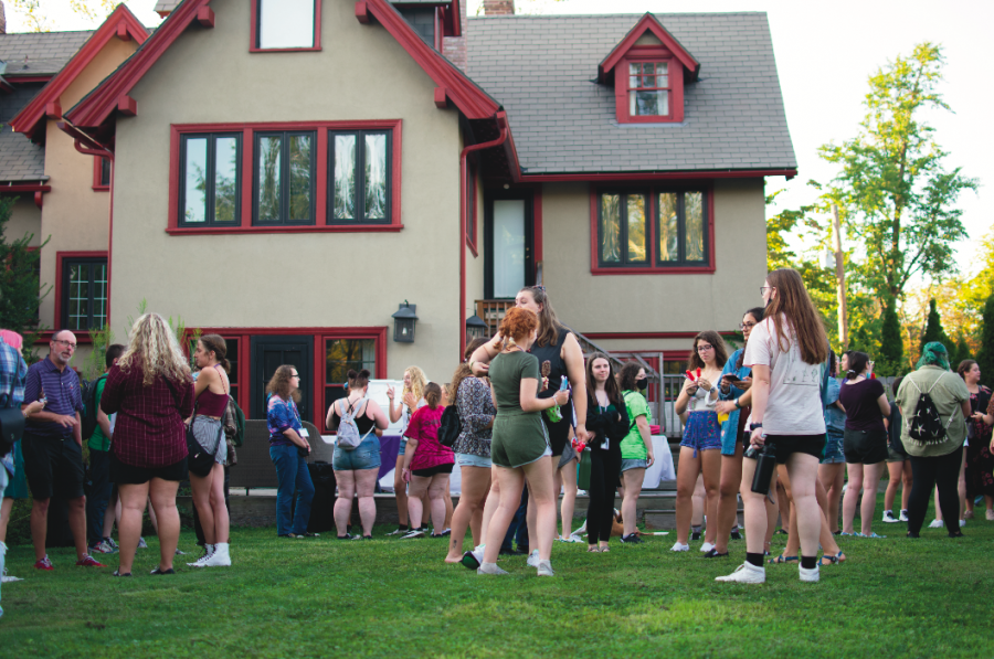 A dessert reception at President Dr. David Finegold's house. First-year students and others gathered to mingle in late August. Photo Credit: Lily Kubit