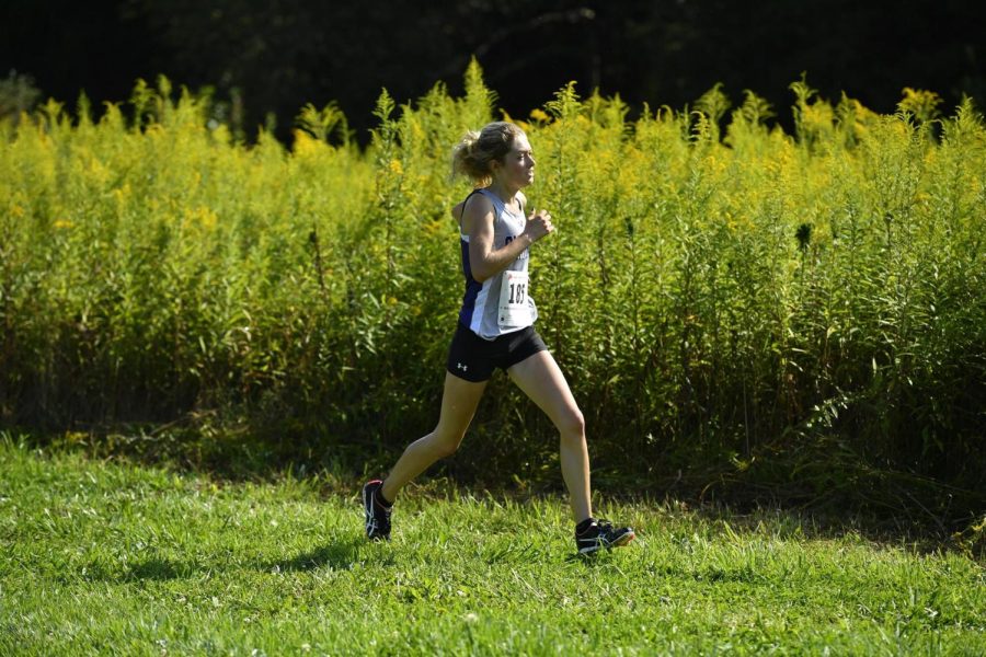 Rebecca Pennington runs for Chatham University. Photo Credit: Chatham Athletics