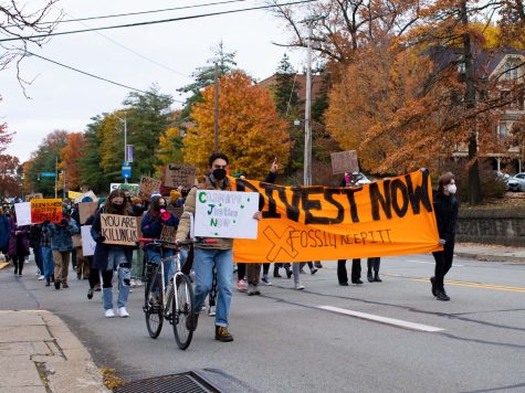 University of Pittsburgh, Chatham University and Carnegie Mellon University students, march for their respective universities to fully divest in fossil fuels. Students chant, “Pitt, Chatham, CMU, divest now or shame on you!” Photo Credits: Kyle Ferreira 