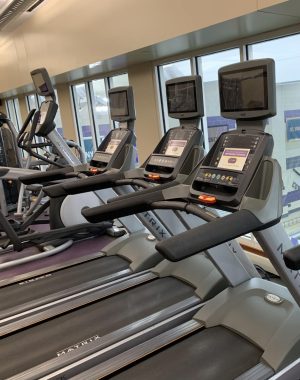 New signs in the Athletic and Fitness Center enforce social distancing by temporarily disabling machines. Photo Credit: Haley Daugherty

