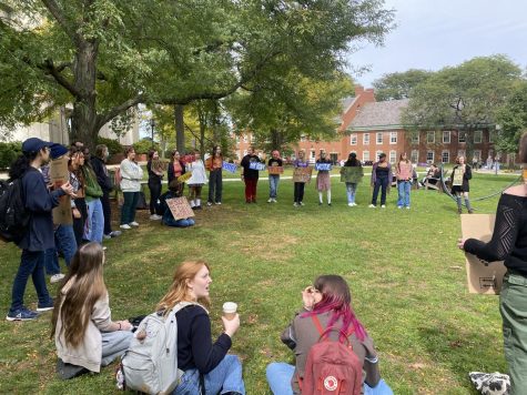 Students gathered in a circle at the Quad. Photo Credit: Carson Gates
