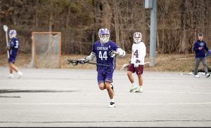 Isaac Joshi carries the ball for Chatham. Photo Credit: Lauren Haak/ Chatham Athletics