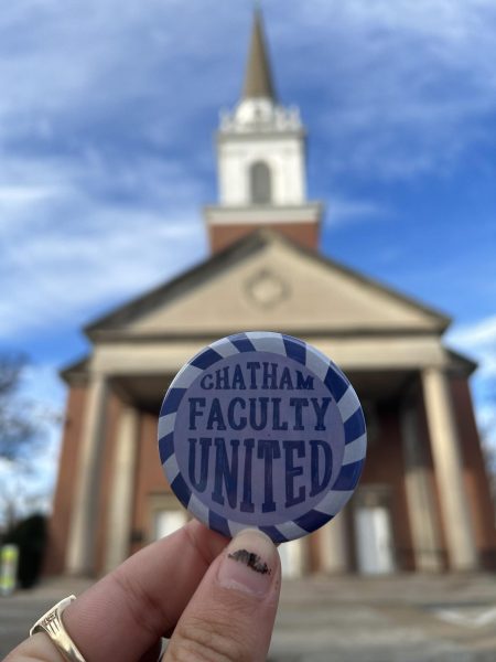 Chatham Faculty United pin in front of the Campbell Memorial Chapel
