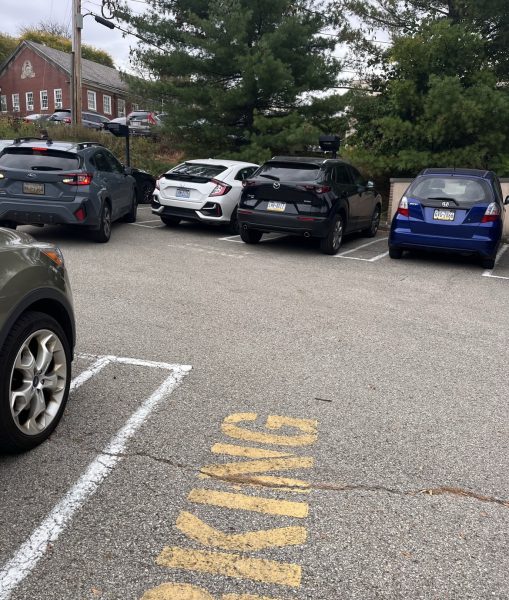 Cars park at Jennie King Mellon Library parking lot.