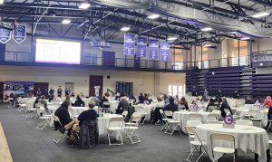 Students and their families gather at scholarship interview day.