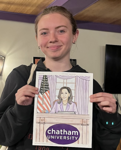 Anna Mack ‘27 with a drawing of Vice
President Kamala Harris at the Chatham
Feminist Coalition’s coloring night, where students shared their feelings on gender equality and politics.