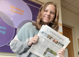 Abigail Hakas ‘24 with a copy of the Communiqué.