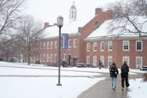 Students brave the cold January weather on their way to class. 