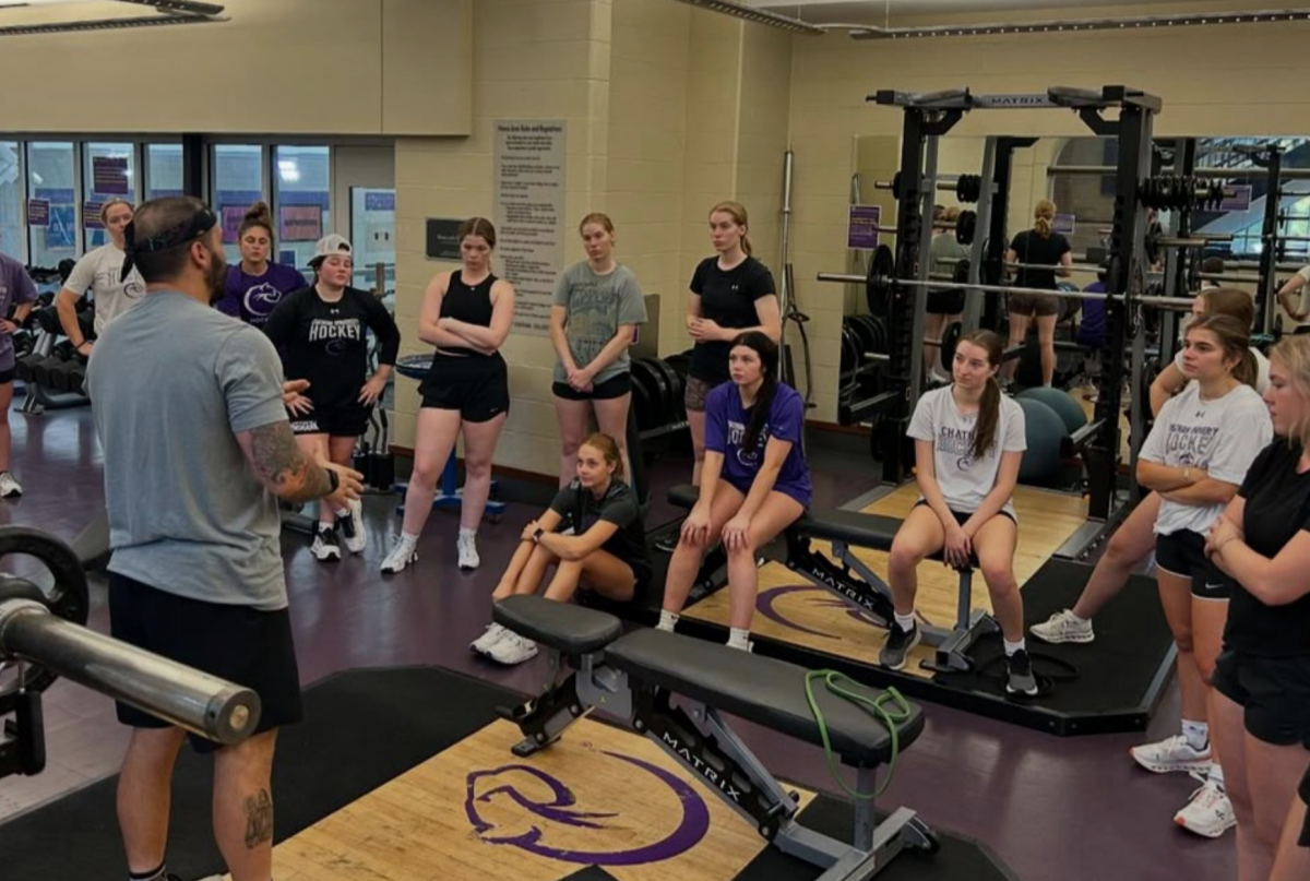 The women’s hockey team gathers in the Athletic & Fitness Center gym for a team lift. Photo credit: Chatham women’s hockey