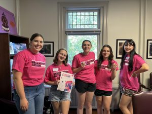 Tiana Eicher '27 (second from left) stands alongside fellow Planned Parenthood Generation Action members. Photo courtesy of Tiana Eicher.