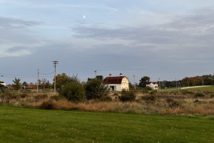 The moon sits over the Eden Hall campus.