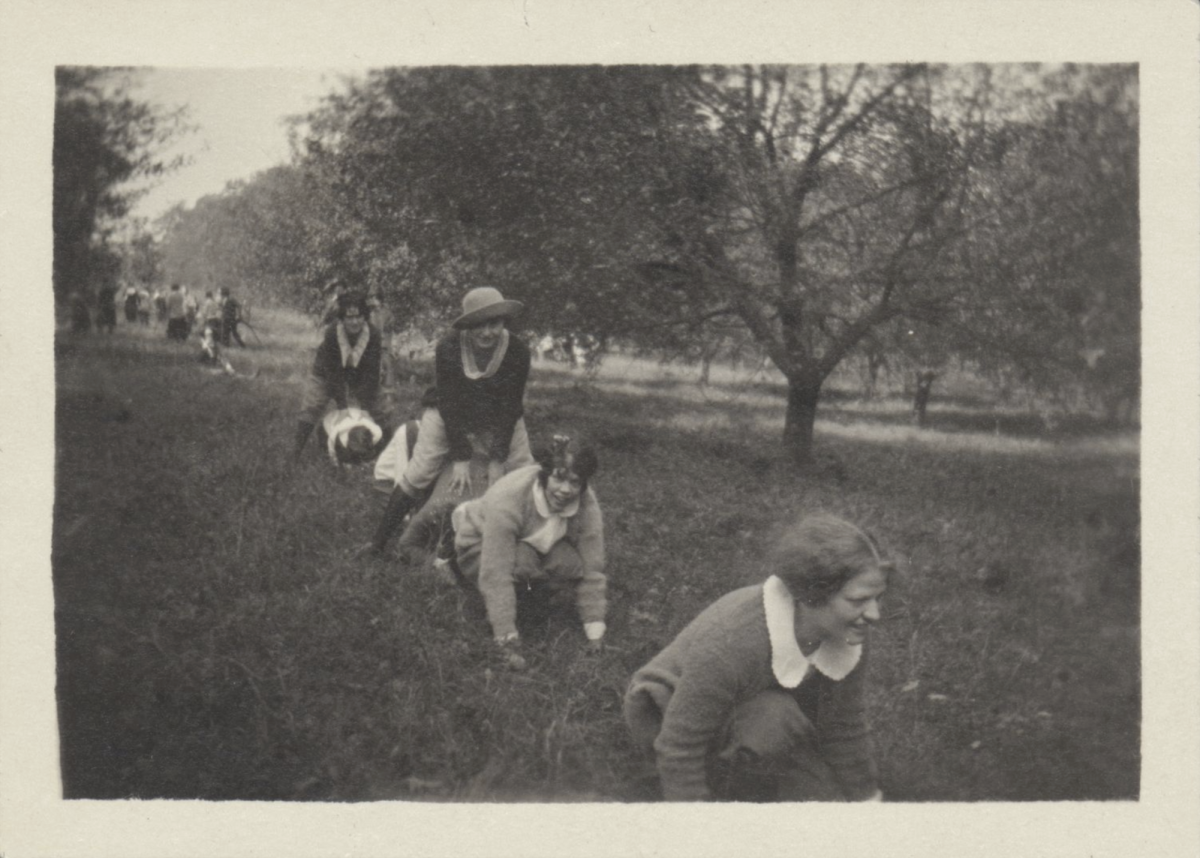 Jean S. MacColl 1925, center on ground and friends play leapfrog on the Allen Farm during Mountain Day, 1923. All photos and information courtesy of the JKM library archives.