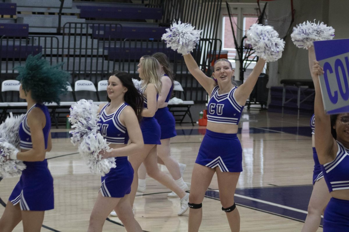 Ava Cinko ‘29, left, and Emma Saylor ‘29 run onto the court during the women’s basketball game on Nov. 15.