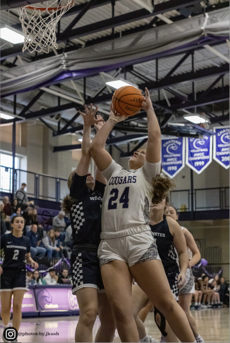 Madison Nereu ‘26 goes up for a layup against Westminster.