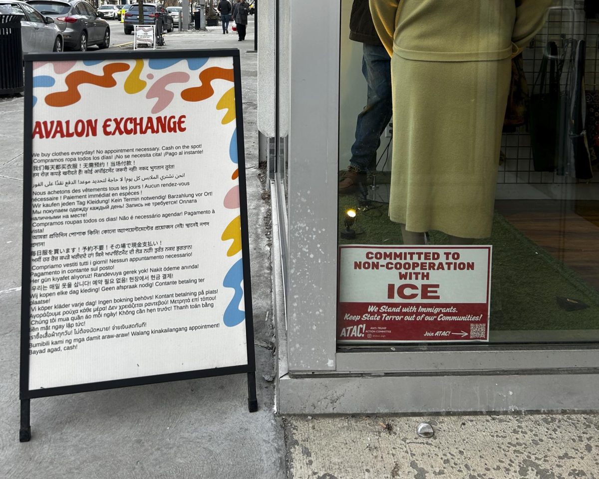 In Pittsburgh's Squirrel Hill neighborhood, storefronts like Avalon Exchange display signs announcing their commitment to immigrant community members and anti-ICE movements.