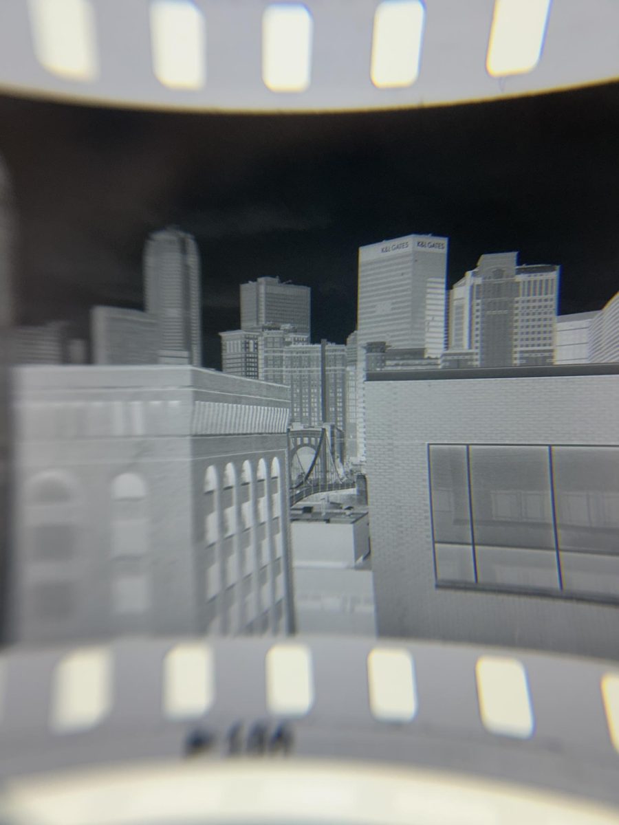 A film negative of the Pittsburgh city skyline taken by Naccarato, originally developed and printed with the intent to run alongside potential coverage.
